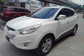 Selling White Hyundai Tucson 2012-3