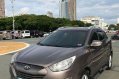 Selling Brown Hyundai Tucson 2011 Automatic Gasoline at 83000 km in Quezon City-1