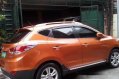 Orange Hyundai Tucson 2013 at 39125 km for sale-4