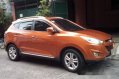 Orange Hyundai Tucson 2013 at 39125 km for sale-0