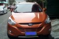 Orange Hyundai Tucson 2013 at 39125 km for sale-1