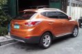 Orange Hyundai Tucson 2013 at 39125 km for sale-3