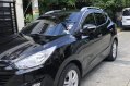 Selling Black Hyundai Tucson 2011 at 62000 km -1