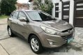 Brown Hyundai Tucson 2012 for sale in Pasay-0