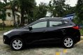 Black Hyundai Tucson 2012 at 50000 km for sale -3