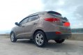 Sell Brown 2011 Hyundai Tucson at 60000 km-2