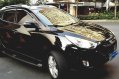 Black Hyundai Tucson 2011 at 37000 km for sale -2
