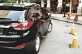 Black Hyundai Tucson 2011 at 37000 km for sale -6