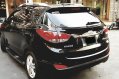 Black Hyundai Tucson 2011 at 37000 km for sale -4