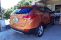 Selling Orange Hyundai Tucson 2013 in San Pascual-0