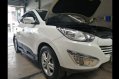 Selling White Hyundai Tucson 2012 in Malolos-0