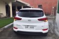 Sell White Hyundai Tucson in Pateros-1