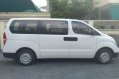 Selling White Hyundai Grand Starex 2017 in Lopez Village Covered Court-1