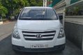 Selling White Hyundai Grand Starex 2017 in Lopez Village Covered Court-0