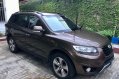 Brown Hyundai Santa Fe 2012 for sale in Manila-1