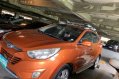 Orange Hyundai Tucson 2013 for sale in Cainta-1