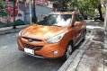 Orange Hyundai Tucson 2014 for sale in Automatic-1