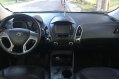 Selling Grey Hyundai Tucson 2012 SUV / MPV at 100000 in Manila-4