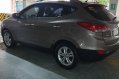 Sell Bronze 2013 Hyundai Tucson in San Juan-4