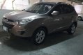Sell Bronze 2013 Hyundai Tucson in San Juan-3