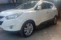 Selling White Hyundai Tucson 2012 in Quezon City-8