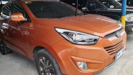 Orange Hyundai Tucson 2014 Automatic Gasoline for sale