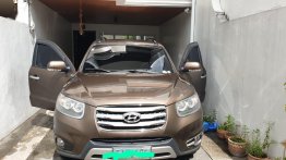 Selling Brown Hyundai Santa Fe 2012 in Quezon City