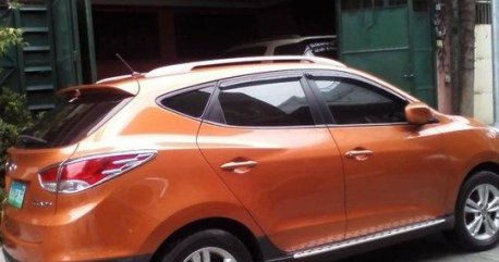 Orange Hyundai Tucson 2013 at 39125 km for sale