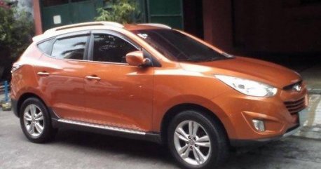 Orange Hyundai Tucson 2013 at 39125 km for sale