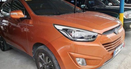 Orange Hyundai Tucson 2014 Automatic Gasoline for sale