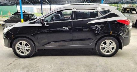 Selling Black Hyundai Tucson 2012 Automatic Gasoline at 57000 km