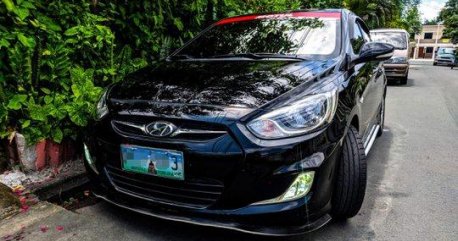 Black Hyundai Accent 2013 at 62000 km for sale 