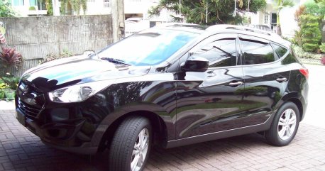 Selling Black Hyundai Tucson 2012 SUV / MPV in Quezon City