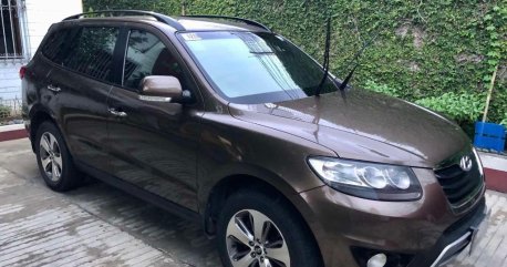 Brown Hyundai Santa Fe 2012 for sale in Manila