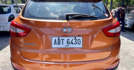 Orange Hyundai Tucson 2014 for sale in Automatic