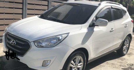 Selling Pearl White Hyundai Tucson 2013 in Antipolo
