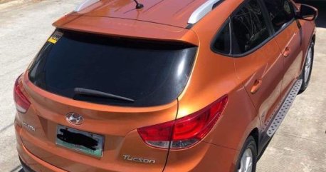 Selling Orange Hyundai Tucson 2013 in Biñan