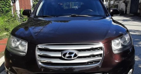 Sell Purple 2012 Hyundai Santa Fe in Quezon City